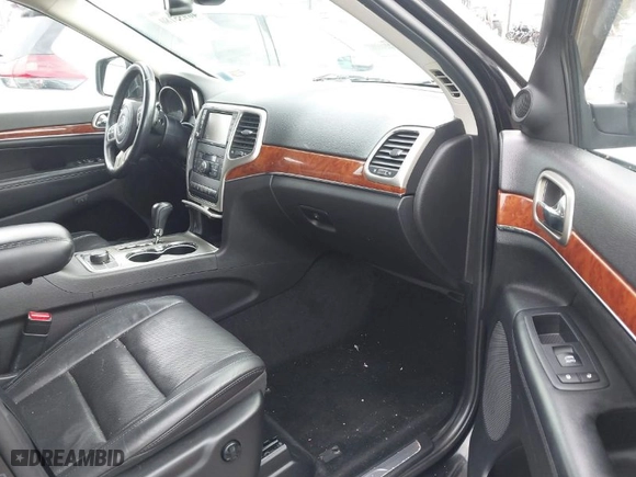 2013 Jeep Grand Cherokee Limited with VIN 1C4RJFBT9DC592257, listed as a IAAI auction lot 40955180 with 130,038 mi miles. Bid and sale history available at carsss.com. Image 5.
