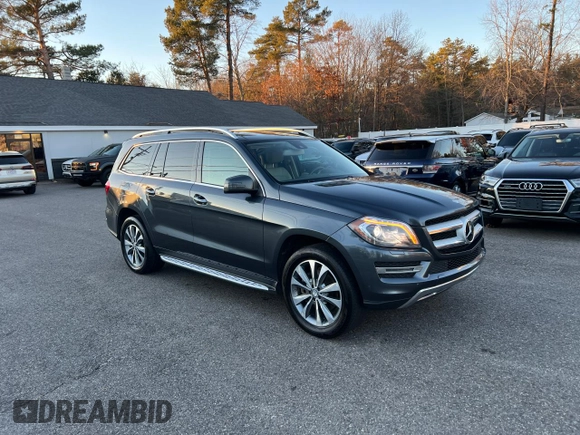 2016 Mercedes-Benz GL with VIN 4JGDF2EEXGA682823, listed as a Copart auction lot 82710124 with 216,598 mi miles and Clean Title. Bid and sale history available at carsss.com. Image 2.