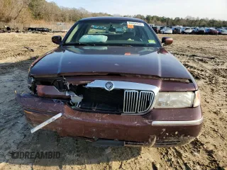2001 Mercury Grand Marquis LS z VIN 2MEFM75W41X706118, wystawiony jako Copart lot #84484434 z przebiegiem 104 946 mil mil oraz Szkoda całkowita • Salvage title. Historia ofert i sprzedaży dostępna na DreamBid. Obrazek 5.