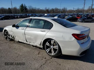 2017 BMW 7 Series 750i with VIN WBA7F0C39HGM22030, listed as a Copart auction lot 87127484 with 110,634 mi miles and Salvage title. Bid and sale history available at DreamBid. Image 2.