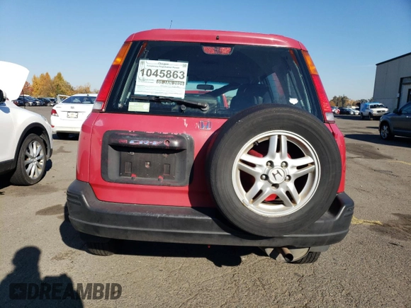 1999 Honda CR-V LX with VIN JHLRD2843XC014579, listed as a Copart auction lot 79394924 with 249,544 mi miles and Salvage Title. Bid and sale history available at carsss.com. Image 6.