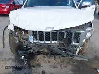 2013 Jeep Grand Cherokee Overland with VIN 1C4RJECT6DC533434, listed as a IAAI auction lot 41656116 with 122,809 mi miles. Bid and sale history available at carsss.com. Image 6.