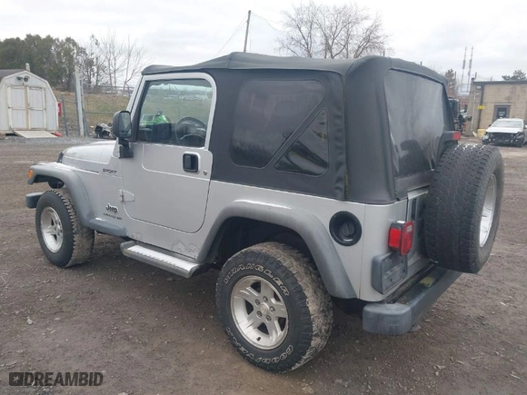 2004 Jeep Wrangler Sport with VIN 1J4FA49S64P749380, listed as a IAAI auction lot 41935405 with 84,690 mi miles. Bid and sale history available at carsss.com. Image 3.