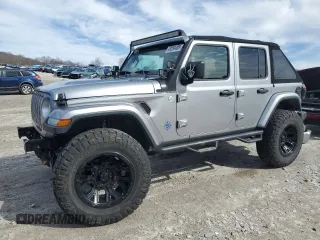 2018 Jeep Wrangler Unlimited Sahara z VIN 1C4HJXEG4JW285606, wystawiony jako Copart lot #49254405 z przebiegiem 57 148 mil mil oraz Szkoda całkowita • Salvage title. Historia ofert i sprzedaży dostępna na DreamBid. Obrazek 1.