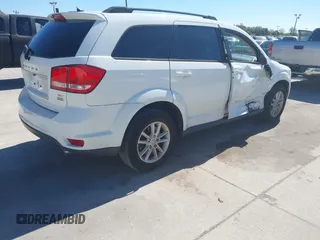 2017 Dodge Journey SXT z VIN 3C4PDCBG9HT510635, wystawiony jako IAAI lot #41590439 z przebiegiem 131 054 mil mil oraz . Historia ofert i sprzedaży dostępna na DreamBid. Obrazek 4.