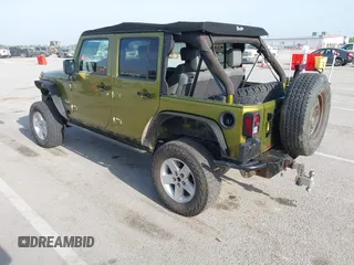 2007 Jeep Wrangler Unlimited Sahara with VIN 1J4GA59177L182593, listed as a IAAI auction lot 42104934 with 158,990 mi miles and . Bid and sale history available at DreamBid. Image 3.