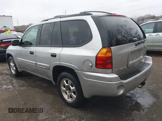 2004 GMC Envoy SLT with VIN 1GKDT13S242398113, listed as a IAAI auction lot 41722942 with 175,173 mi miles and . Bid and sale history available at DreamBid. Image 3.