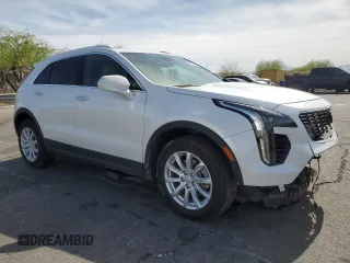 2023 Cadillac XT4 FWD Luxury with VIN 1GYAZAR46PF134602, listed as a Copart auction lot 54684865 with 13,221 mi miles and Salvage title. Bid and sale history available at DreamBid. Image 4.