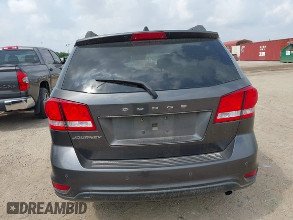 2019 Dodge Journey SE with VIN 3C4PDCBBXKT860142, listed as a IAAI auction lot 42126997 with 101,675 mi miles and . Bid and sale history available at DreamBid. Image 16.
