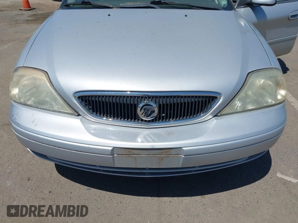 2002 Mercury Sable GS z VIN 1MEFM50U72A624825, wystawiony jako IAAI lot #42463081 z przebiegiem 88 873 mil mil oraz . Historia ofert i sprzedaży dostępna na DreamBid. Obrazek 6.