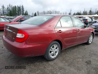 2004 Toyota Camry LE with VIN 4T1BF32K74U069737, listed as a IAAI auction lot 41746236 with 48,026 mi miles. Bid and sale history available at carsss.com. Image 4.