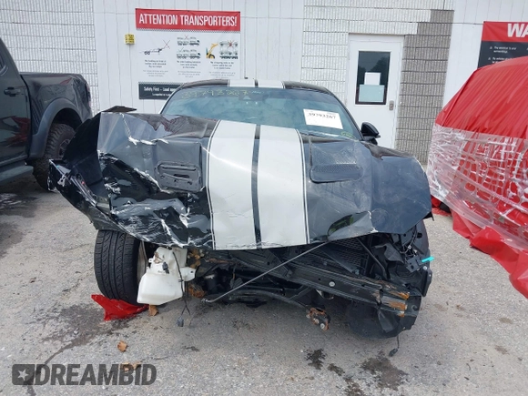 2021 Ford Mustang EcoBoost z VIN 1FA6P8TH4M5117245, wystawiony jako IAAI lot #39793267 z przebiegiem 15 913 mil mil oraz . Historia ofert i sprzedaży dostępna na DreamBid. Obrazek 12.