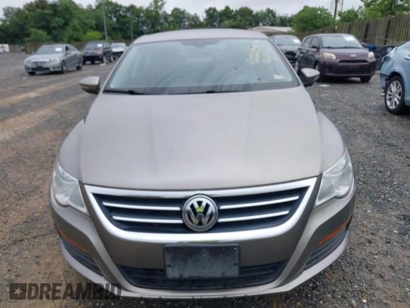 2012 Volkswagen CC R-Line z VIN WVWMP7AN2CE503052, wystawiony jako IAAI lot #42521596 z przebiegiem 136 930 mil mil oraz . Historia ofert i sprzedaży dostępna na DreamBid. Obrazek 6.