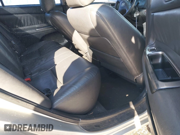 2003 Toyota Camry LE z VIN 4T1BF32K03U561492, wystawiony jako IAAI lot #41607321 z przebiegiem 171 920 mil mil oraz . Historia ofert i sprzedaży dostępna na DreamBid. Obrazek 8.