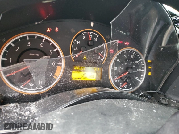 2010 Nissan Titan SE with VIN 1N6BA0ED6AN312861, listed as a Copart auction lot 88127865 with 166,205 mi miles and Salvage Title. Bid and sale history available at carsss.com. Image 9.