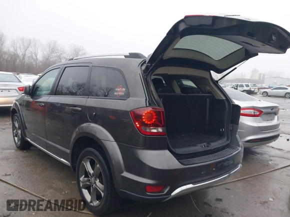2017 Dodge Journey Crossroad Plus z VIN 3C4PDCGB5HT501363, wystawiony jako IAAI lot #41178334 z przebiegiem 119 076 mil mil oraz . Historia ofert i sprzedaży dostępna na DreamBid. Obrazek 3.