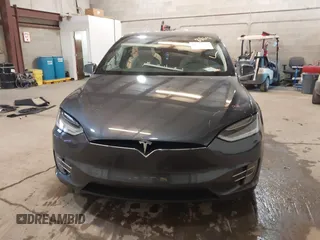 2016 Tesla Model X 70D with VIN 5YJXCBE2XGF025303, listed as a IAAI auction lot 41558869 with 77,793 mi miles and . Bid and sale history available at DreamBid. Image 13.