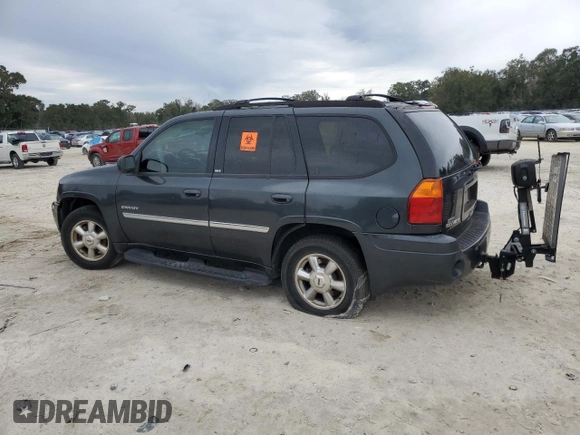 2006 GMC Envoy SLE with VIN 1GKDS13S562135135, listed as a Copart auction lot 88353995 with 159,251 mi miles and Salvage Title. Bid and sale history available at carsss.com. Image 2.