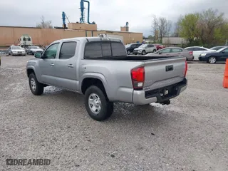 2020 Toyota Tacoma 4WD SR5 with VIN 3TMCZ5AN2LM300117, listed as a IAAI auction lot 41874864 with 59,594 mi miles. Bid and sale history available at carsss.com. Image 3.