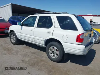 2001 Isuzu Rodeo S with VIN 4S2CK58W614332181, listed as a IAAI auction lot 42585130 with 196,497 mi miles and . Bid and sale history available at DreamBid. Image 3.
