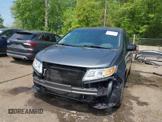 2012 Honda Odyssey EX-L with VIN 5FNRL5H67CB041252, listed as a IAAI auction lot 42158494 with 152,940 mi miles and . Bid and sale history available at DreamBid. Image 6.