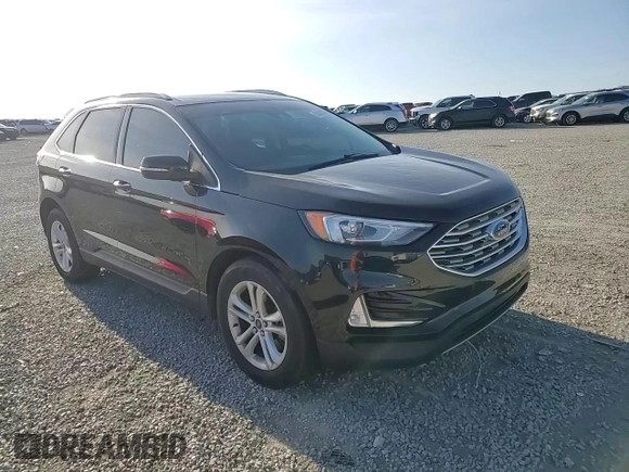 2019 Ford Edge SEL z VIN 2FMPK4J91KBC60322, wystawiony jako Copart lot #53502375 z przebiegiem 103 430 mil mil oraz Szkoda całkowita • Salvage title. Historia ofert i sprzedaży dostępna na DreamBid. Obrazek 14.