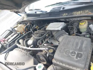 2004 Jeep Grand Cherokee Laredo z VIN 1J4GW48S54C106405, wystawiony jako IAAI lot #42315689 z przebiegiem 104 416 mil mil oraz . Historia ofert i sprzedaży dostępna na DreamBid. Obrazek 10.