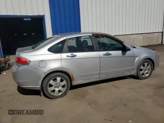 2009 Ford Focus SE z VIN 1FAHP35N29W126266, wystawiony jako Copart lot #56886465 z przebiegiem 420 672 mil mil oraz Czysty tytuł • Clean title. Historia ofert i sprzedaży dostępna na DreamBid. Obrazek 3.