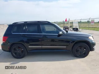 2013 Mercedes-Benz GLK with VIN WDCGG5HB2DF990806, listed as a IAAI auction lot 42047198 with 130,728 mi miles. Bid and sale history available at carsss.com. Image 13.