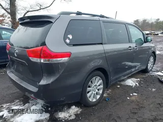 2012 Toyota Sienna XLE with VIN 5TDDK3DC9CS047014, listed as a IAAI auction lot 41551585 with 164,440 mi miles. Bid and sale history available at carsss.com. Image 4.