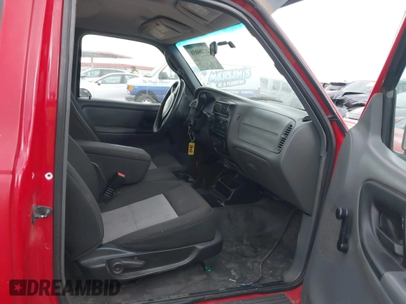 2005 Ford Ranger XL with VIN 1FTYR15E95PA58593, listed as a IAAI auction lot 41706058 with 129,282 mi miles. Bid and sale history available at carsss.com. Image 5.