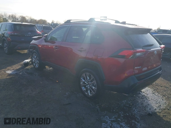 2021 Toyota RAV4 XLE Premium with VIN 2T3C1RFV1MW145048, listed as a IAAI auction lot 41018272 with 61,959 mi miles and . Bid and sale history available at DreamBid. Image 3.