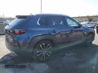 2023 Mazda CX-50 Premium Plus with VIN 7MMVABEY1PN125180, listed as a Copart auction lot 52075375 with 32,483 mi miles and Salvage Title. Bid and sale history available at DreamBid. Image 3.