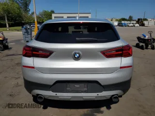 2021 BMW X2 sDrive28i z VIN WBXYH9C06M5S54903, wystawiony jako Copart lot #57177885 z przebiegiem 106 563 mil mil oraz Tytuł czysty. Historia ofert i sprzedaży dostępna na DreamBid. Obrazek 6.