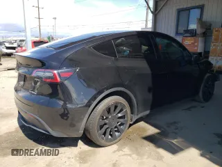 2021 Tesla Model Y Long Range z VIN 5YJYGDEEXMF207223, wystawiony jako Copart lot #48800445 z przebiegiem 44 508 mil mil oraz Szkoda całkowita • Salvage title. Historia ofert i sprzedaży dostępna na DreamBid. Obrazek 3.