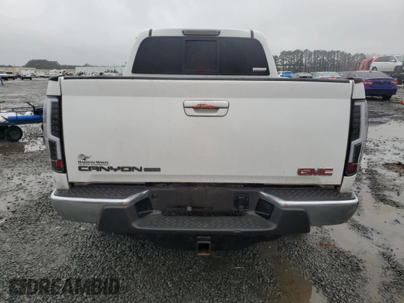 2009 GMC Canyon SLE1 with VIN 1GTDS13L798110159, listed as a Copart auction lot 45008035 with 161,115 mi miles and Salvage Title. Bid and sale history available at carsss.com. Image 6.