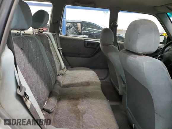 1999 Subaru Forester L with VIN JF1SF6350XH747102, listed as a Copart auction lot 41376465 with 199,771 mi miles and Salvage Title. Bid and sale history available at carsss.com. Image 10.