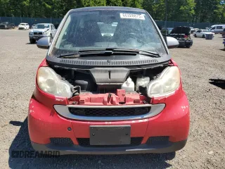 2009 Smart fortwo Pure with VIN WMEEJ31X29K236894, listed as a Copart auction lot 60328875 with 109,337 mi miles and Clean title. Bid and sale history available at DreamBid. Image 5.