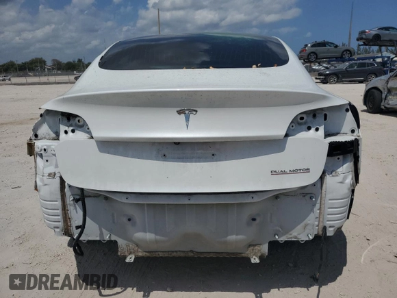 2019 Tesla Model 3 Long Range with VIN 5YJ3E1EB5KF418329, listed as a Copart auction lot 52183935 with 121,784 mi miles and Salvage Title. Bid and sale history available at DreamBid. Image 6.