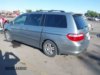 2006 Honda Odyssey EX-L z VIN 5FNRL38766B102432, wystawiony jako IAAI lot #42356315 z przebiegiem 214 261 mil mil oraz . Historia ofert i sprzedaży dostępna na DreamBid. Obrazek 3.