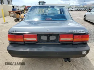 1990 Toyota Camry z VIN JT2VV21E2L0114723, wystawiony jako Copart lot #53584755 z przebiegiem 58 986 mil mil oraz Czysty tytuł • Clean title. Historia ofert i sprzedaży dostępna na DreamBid. Obrazek 6.