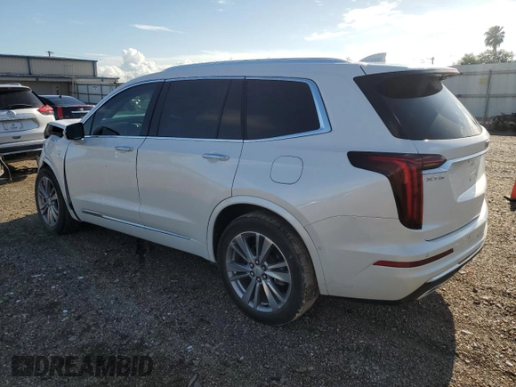 2023 Cadillac XT6 FWD Premium Luxury with VIN 1GYKPCRS5PZ120905, listed as a Copart auction lot 64374254 with 30,694 mi miles and Salvage title. Bid and sale history available at DreamBid. Image 2.