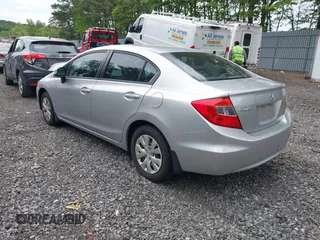 2012 Honda Civic LX z VIN 19XFB2F57CE013066, wystawiony jako IAAI lot #42344054 z przebiegiem 185 986 mil mil oraz . Historia ofert i sprzedaży dostępna na DreamBid. Obrazek 3.