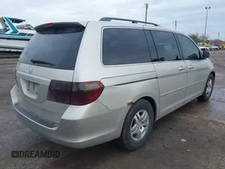 2006 Honda Odyssey EX-L z VIN 5FNRL38766B018014, wystawiony jako IAAI lot #41497144 z przebiegiem 230 225 mil mil oraz . Historia ofert i sprzedaży dostępna na DreamBid. Obrazek 4.