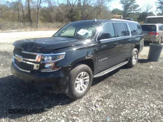 2019 Chevrolet Suburban LT with VIN 1GNSCHKCXKR405939, listed as a IAAI auction lot 41591475 with 106,554 mi miles and . Bid and sale history available at DreamBid. Image 18.