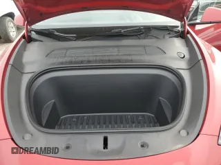 2023 Tesla Model Y Performance z VIN 7SAYGDEF2PF857843, wystawiony jako Copart lot #57324255 z przebiegiem 22 618 mil mil oraz Szkoda całkowita • Salvage title. Historia ofert i sprzedaży dostępna na DreamBid. Obrazek 12.