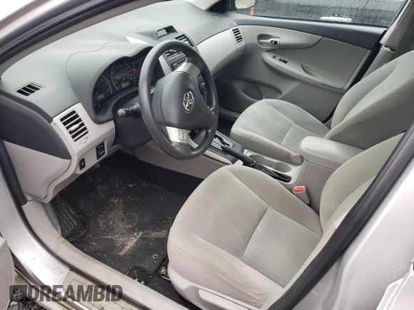 2012 Toyota Corolla L with VIN 2T1BU4EE2CC885174, listed as a Copart auction lot 50716125 with 77,096 mi miles and Salvage Title. Bid and sale history available at carsss.com. Image 7.