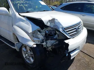 2007 Lexus GX with VIN JTJBT20X570144529, listed as a IAAI auction lot 42035412 with 265,886 mi miles. Bid and sale history available at carsss.com. Image 6.