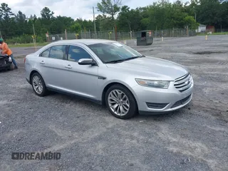 2013 Ford Taurus Limited z VIN 1FAHP2F87DG235392, wystawiony jako IAAI lot #42431543 z przebiegiem 123 904 mil mil oraz . Historia ofert i sprzedaży dostępna na DreamBid. Obrazek 1.