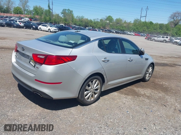 2014 Kia Optima LX with VIN 5XXGM4A72EG339998, listed as a IAAI auction lot 42132720 with 186,989 mi miles. Bid and sale history available at carsss.com. Image 4.